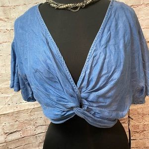 Medium-  low crop top